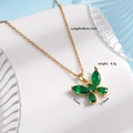 Collana a farfalla dorata con cristalli marquise verde smeraldo e catena a maglie - Verde