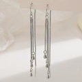 Elegant silver long tassel earrings with delicate drop pendants on a minimal stand - Water Drop Tassel Ear Threader