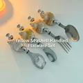 Juego de cubiertos creativo con mangos de concha natural y puntas de acero inoxidable - Cuchillo de mantequilla de concha de Rong amarillo
