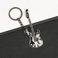 Guitar keychain with black and silver finish featuring crystal rhinestones and pearly gems - Black Beaded Rhinestone Guitar