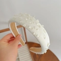 White sponge headband with hollow heart design and matte finish for high top hair - Beige