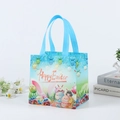 Reusable light blue Happy Easter tote bag with bunny and egg prints and blue handles - Style D01