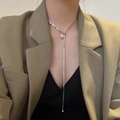 Silver tassel necklace with pearl pendant worn on a model in a minimalist style - 83#X3356 (Silver Long Tassel Artificial Pearl Necklace)