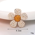 Detailed view of 4.2cm diamond flower charm with gold base and amber crystal center - Sunflower (Large)