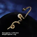 Detailed close-up of vintage gold snake brooch with black bead and scale textures - Gold Snake with Bead (XZ24213)