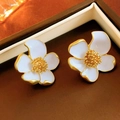 Vintage flower earrings with white enamel petals and gold finish in a jewelry box - 52 Silver Pin-White Flower
