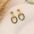 Detail view of oval geometric earrings in gold and dark green on a beige stone background - 5# Oval Green