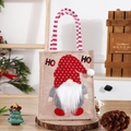 Rustic jute Christmas gift bag with a 3D gnome applique and red striped handles - Faceless Gnome Dot Bag