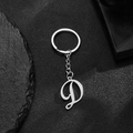 Artistic silver stainless steel keychain featuring a polished letter D alphabet pendant - Letter D