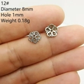Macro shot of 8mm vintage hollow floral bead spacer for DIY jewelry making - Style 12