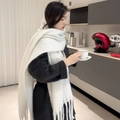 White knitted plaid scarf with long tassels paired with dark coat for winter warmth - Solid Rice White