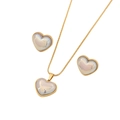 Golden heart jewelry set with pearl white center including necklace and earrings - Gray Blue