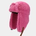 Detailed view of pink faux lamb wool trapper hat with brown leather chin strap and buckle - One Size / Rose Red