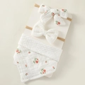 Close-up of floral muslin baby bib and matching bow headbands on display card - 1-Red Rose Floral