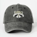 Close-up of raccoon embroidery on washed cotton fabric of the vintage baseball cap - One Size / Black