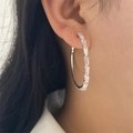 Silver geometric C-shaped earrings with clear rectangular zircons worn by model - Large Hoop Style (Style A) / White-A