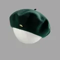 Dark green wool beret for women with a vintage golden oval metal badge detail - M (56-58cm) / Dark Green