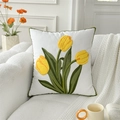 White sofa cushion featuring yellow tulip embroidery and green piping accents - 3 Yellow Tulips (Cover Only)