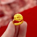 Elegant gold bow heart ring featuring a red flower design with an adjustable band - Golden Wealth Flower Ring