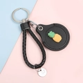 Black woven leather keychain with a yellow 3D pineapple charm and silver tag detail - Hand Strap Style - Pineapple Black