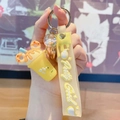 Portachiavi a tazza di gelato giallo con ciondolo a ciambella e cinturino in silicone - Giallo