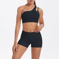 Detail of black one-shoulder yoga sports bra with hollow cutout and matching high waist shorts - S / Black