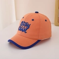 Detail showing Stay Cool embroidery on orange cotton kids cap with blue brim - 48-52cm (2-6 Years) / Orange