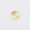 Detail shot of a golden metal round pendant with hollow cactus design for DIY jewelry - Cactus