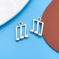 Silver musical note metal charms for DIY jewelry making on a blue background - 1pc Antique Silver Musical Note 13x21mm
