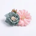 Detail of fabric rose and daisy hair clip with delicate beads and golden accents - Style 7 (Blue & Pink Color Block Flower)