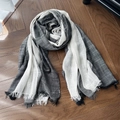 Dark gray and white striped cotton linen scarf with fringe edges on wood floor - Black Stripe Gradient