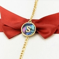 18k gold plated bracelet with a circular abalone shell charm featuring letter S - Letter S