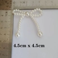 Detailed scale view of 4.5cm white handmade pearl bow accessory for DIY crafts - 48-Pearl Bow Large