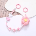 Pink beaded phone wrist strap with plush knit flower and heart beads in sweet style - Pink Flower Style (K2661)