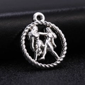 Macro detail of antique silver Gemini zodiac pendant with intricate rope edge design - Style 7 / Antique Silver