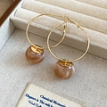 Detail of gold hoop earrings with brown resin beads on a beige velvet jewelry box tray - Hoop Style (2# Light Coffee) / Light Coffee