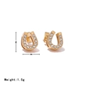 Gouden hoefijzer oorbellen met glinsterende strass-steentjes in 9x8mm formaat - Goud