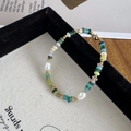 Detailed shot of Bohemian handmade necklace with colorful natural stones and pearls - Bracelet / Green Tea Bracelet