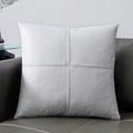 Light gray square tech cloth pillow cover with cross stitching on a leather sofa - Premium Grey
