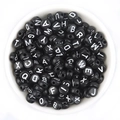Flat round black acrylic letter beads with white alphabet print for DIY bracelet making - Black + White Text