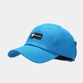 Close-up of blue baseball cap with black 'HAND MADE' patch and metallic air vents - Blue