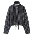 Detailed view of polka dot jacket with stand collar and drawstring hem design - Black Polka Dot Top