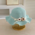Close-up of mint green straw hat with white lace ribbon and crochet flower details - Single Hat-Mint Green