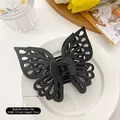Matte black oversized butterfly hair claw clip measuring 13.5cm wide for thick hair - Black