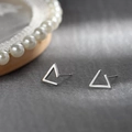 Minimalist 925 sterling silver geometric triangle stud earrings on grey background - Irregular Shape / Silver