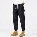 Men's black camo joggers with drawstring waist and multi-pocket cargo detailing - Black
