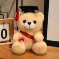 Light brown graduation teddy bear with black mortarboard and red congratulations sash - Red Sash Style / Tan