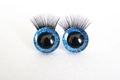 Pair of large doll eyes with blue glitter irises and long black lashes on white background - Dark Blue / 14mm