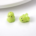 Close-up of green cartoon ghost resin beads for DIY jewelry and phone chain making - 17*15mm / Green