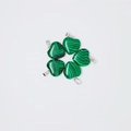 Five heart-shaped malachite pendants with green wave textures and silver bails - Synthetic Malachite